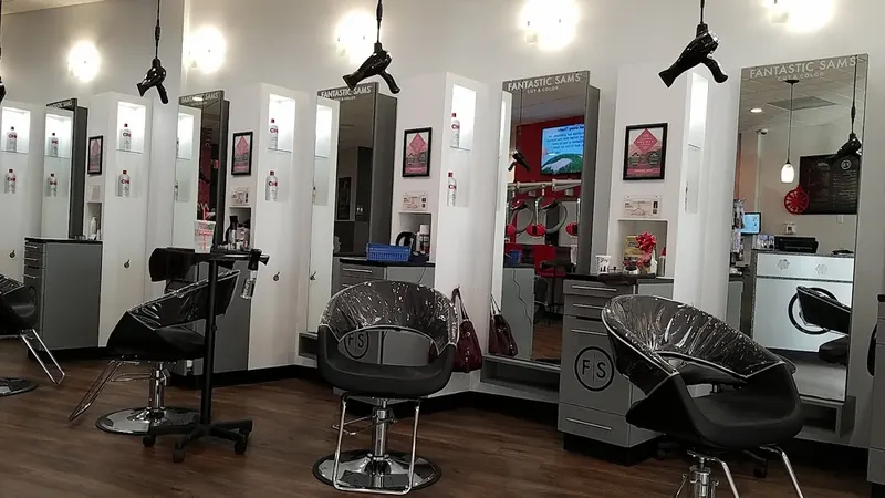 Styling stations with ceiling-hung dryers